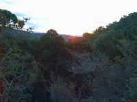 the sun sets above the Murrindindi scenic reserve