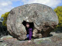 an unusual feature of the district are the hollowed granite boulders.  What forces shaped these rocks?